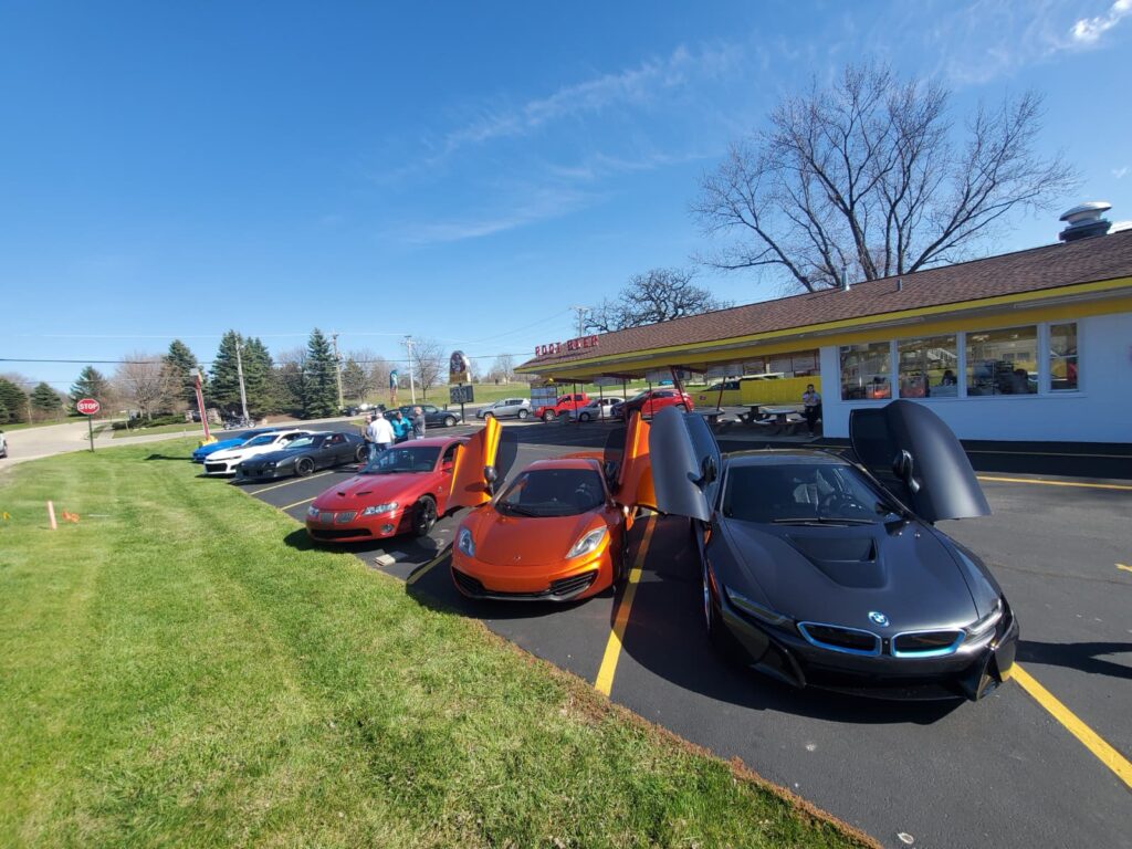 ChapterDrive community cars gathered outside a local restaurant