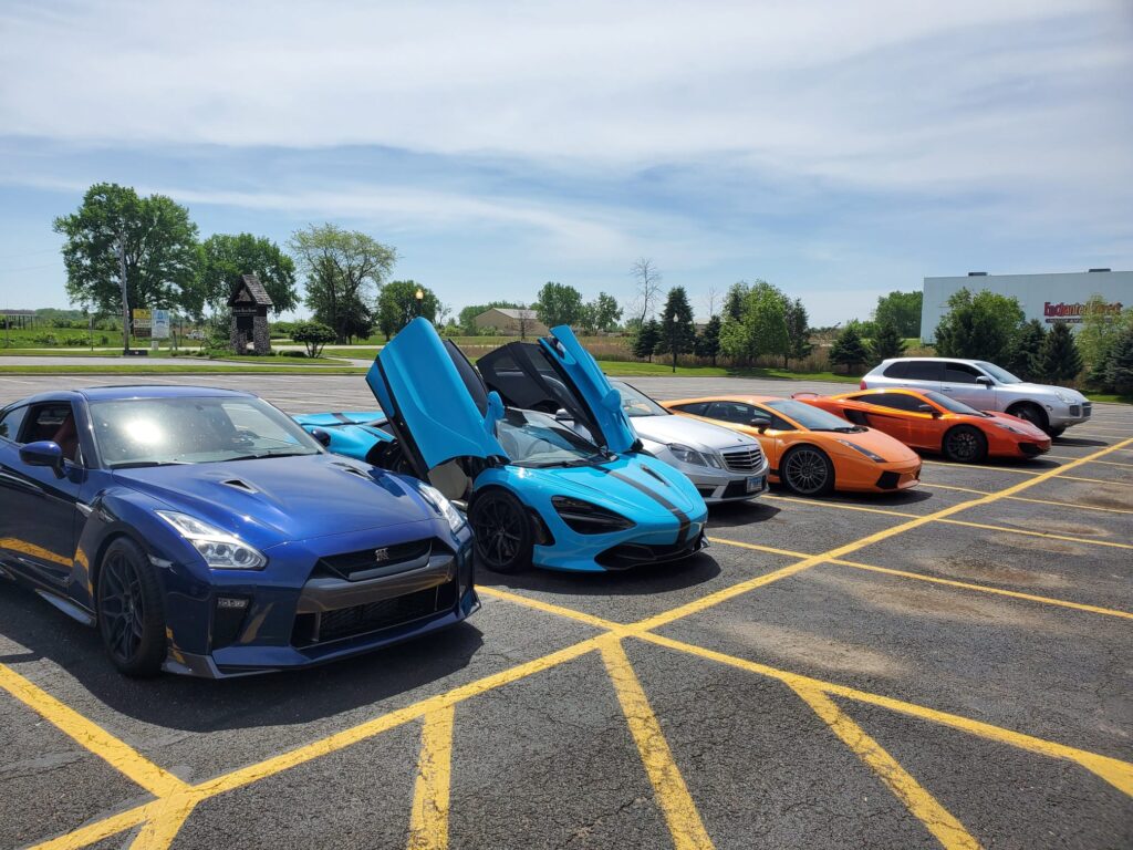 Community gathering and parked cars
