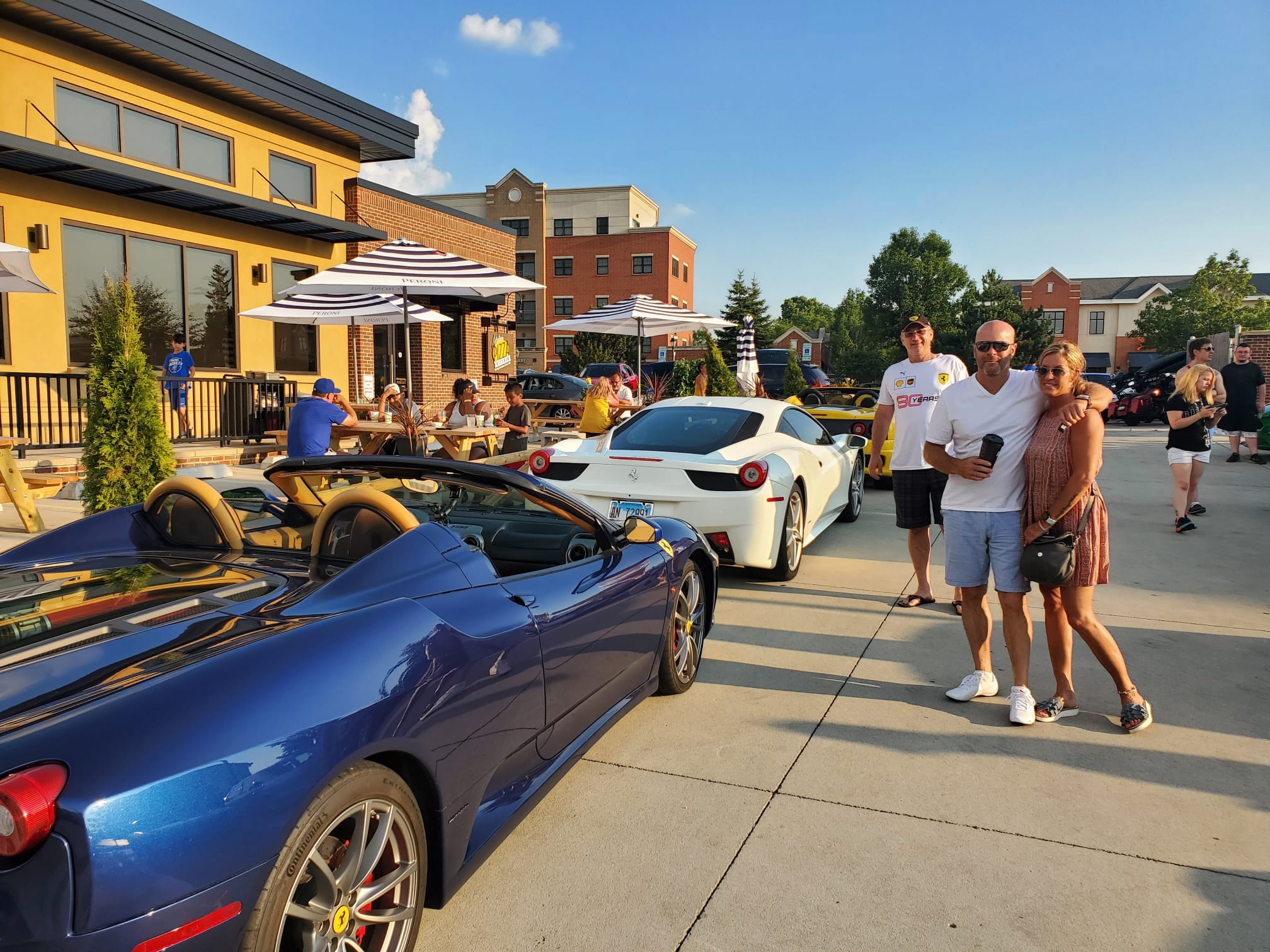 Adult attendees with parked cars